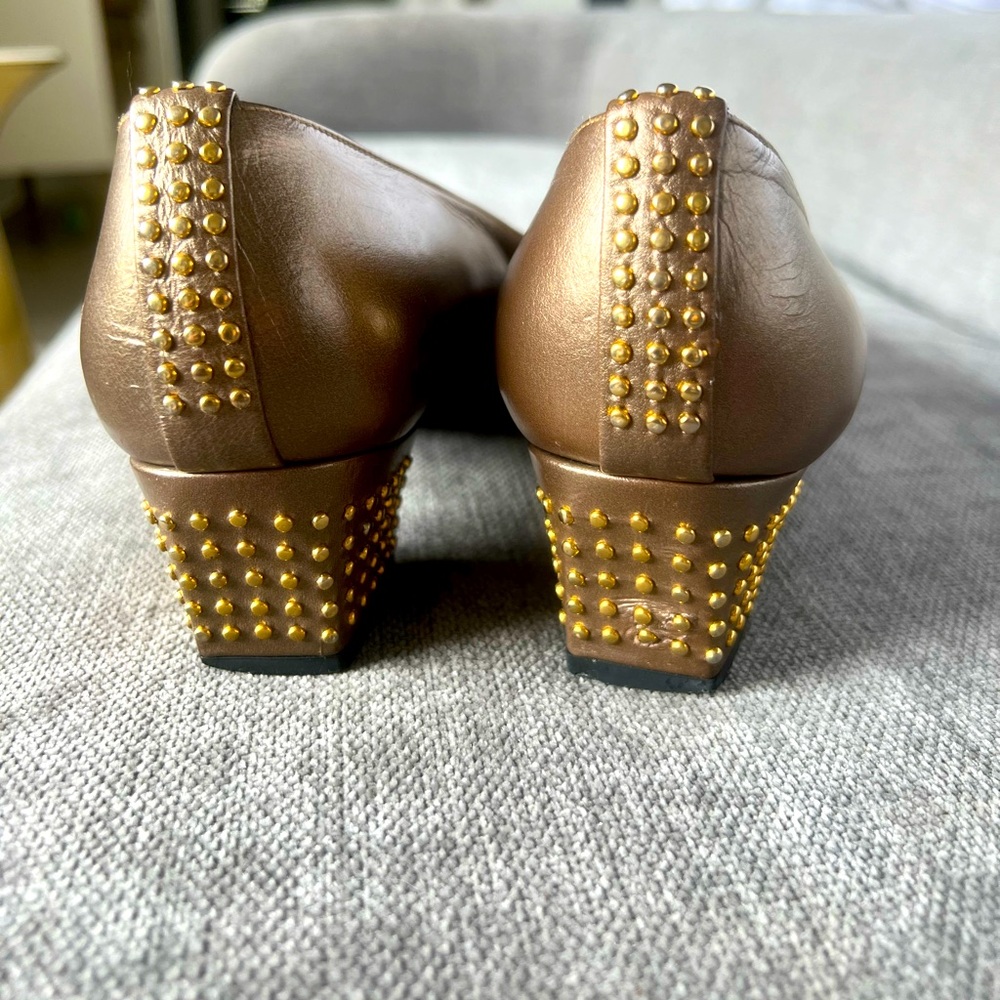 Stuart Weitzman gold studded pumps